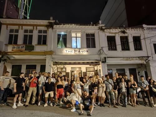 a group of people standing in front of a building at The Manor by Mingle - FREE Breakfast with Poolside Access in Kuala Lumpur