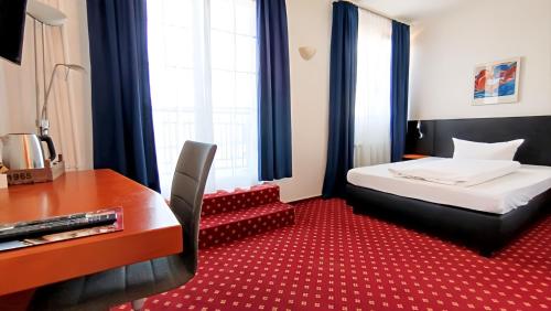 Katil atau katil-katil dalam bilik di Hotel Schwert