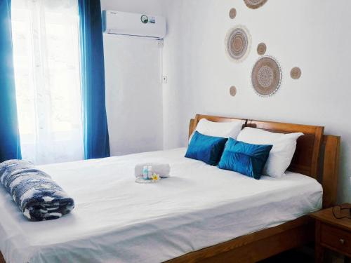 Postel nebo postele na pokoji v ubytování Coco Haven Mauritius