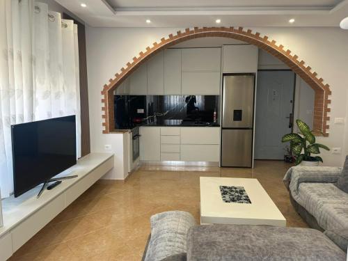 Kuchyň nebo kuchyňský kout v ubytování Dion apartamen