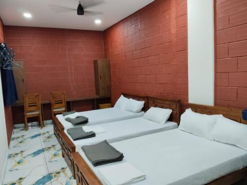 Voodi või voodid majutusasutuse Anantha Guest House toas