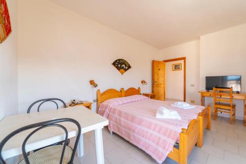 Ένα ή περισσότερα κρεβάτια σε δωμάτιο στο hotel panorama