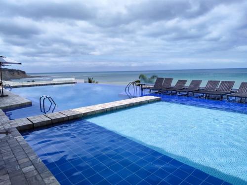 Swimmingpoolen hos eller tæt på Edificio Poseidon Depto. Vista Lateral al Mar