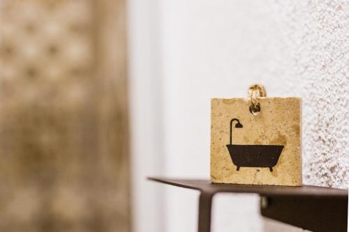 a paper bag sitting on top of a table at Boii Rest & Breakfast in Siğacık