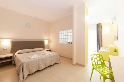 Katil atau katil-katil dalam bilik di Diano Sporting Apartments