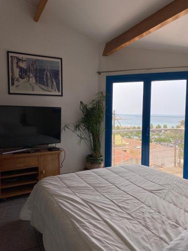 Ένα ή περισσότερα κρεβάτια σε δωμάτιο στο Le Loft