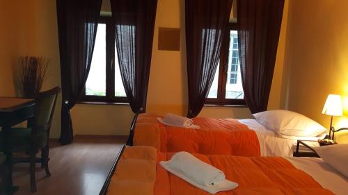 Katil atau katil-katil dalam bilik di Bed & Breakfast Antico