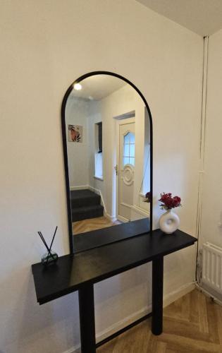 a mirror on a table in a room at Spacious 3bed, Sleeps5, Parking in Birmingham