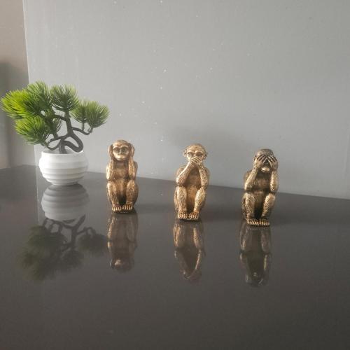 a group of figurines sitting on a table with a plant at Spacious 3bed, Sleeps5, Parking in Birmingham