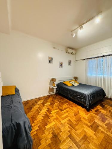 Ένα ή περισσότερα κρεβάτια σε δωμάτιο στο Ana rent