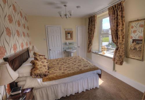 Postel nebo postele na pokoji v ubytování Cornlee