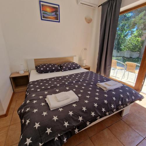 Postel nebo postele na pokoji v ubytování D&D Rooms