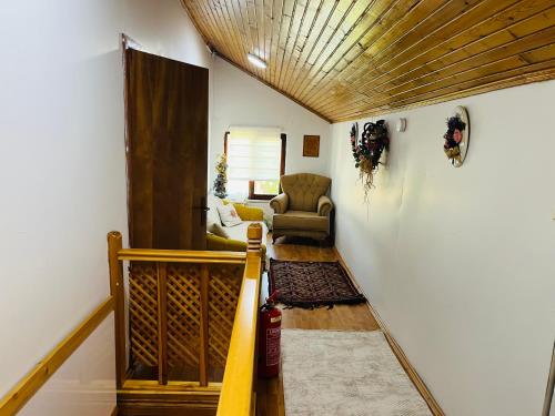 a living room with a baseball bat in a room at Eren Villa in Sapanca