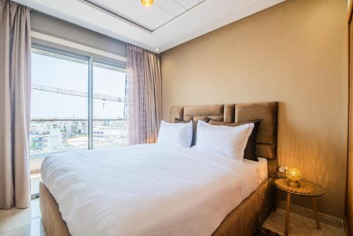 Ένα ή περισσότερα κρεβάτια σε δωμάτιο στο New Luxury Apartment 130sqm with SeaView WiFi Unlimited with Optical Fiber