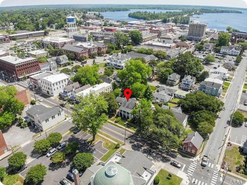 an aerial view of a city with a red marker at Blue Ruby Inn in Elizabeth City