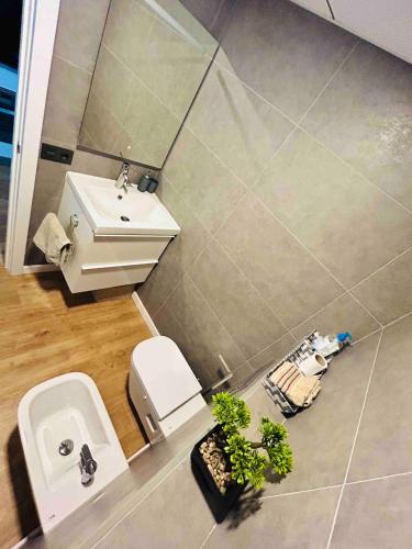 a bathroom with a sink and a toilet at TrendyHomes Aguadulce Bay II in Aguadulce