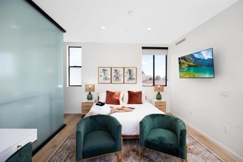 En eller flere senge i et værelse på Trendy Chic