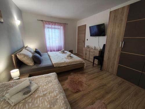 Postel nebo postele na pokoji v ubytování Holiday Home Kresić