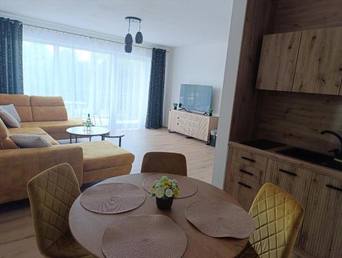 Televisyen dan/atau pusat hiburan di Apartmán A-103 Brezovina