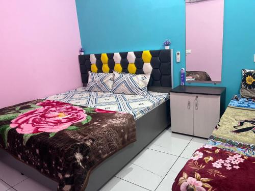 Ένα ή περισσότερα κρεβάτια σε δωμάτιο στο Tiwari home stay