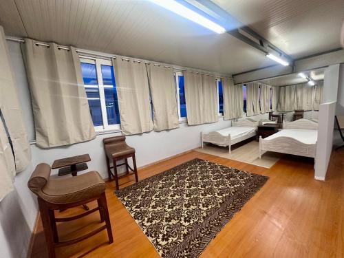 Кровать или кровати в номере Dionisia sunshine view house with gym