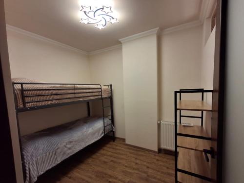 Krevet ili kreveti u jedinici u okviru objekta Yerevan Nar-Dos