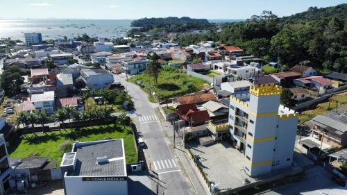 an aerial view of a city with buildings at Pousada Castelo do Rei in Penha