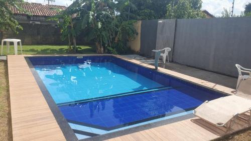 Πισίνα στο ή κοντά στο Casa 5 quartos Aluguel Temporada Residencial Mirandinha
