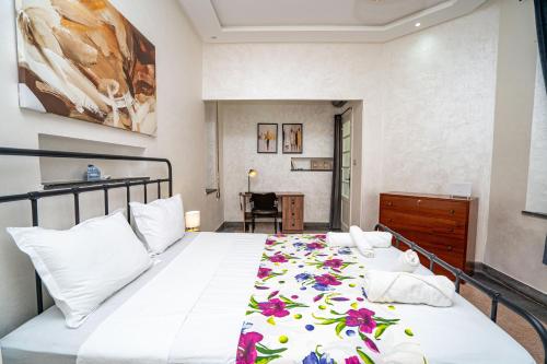 Postel nebo postele na pokoji v ubytování Appartement S&K House