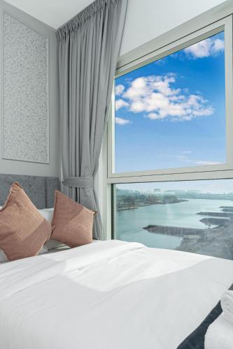 Ein Bett oder Betten in einem Zimmer der Unterkunft Desert Key - Perfectly Located Yas Island Premier Apts