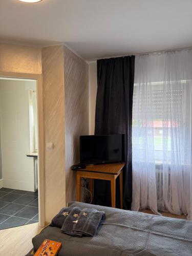 Una cama o camas en una habitación de Passion