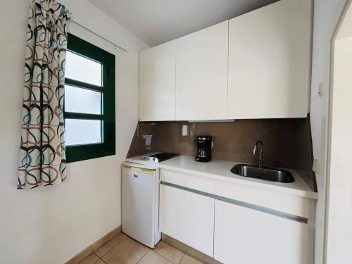 Kuchyň nebo kuchyňský kout v ubytování Relax Mogán vivienda vacacional