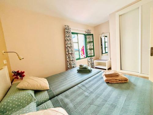 Postel nebo postele na pokoji v ubytování Relax Mogán vivienda vacacional