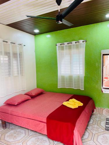 Megha Guesthouseにあるベッド
