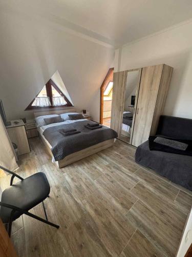 Katil atau katil-katil dalam bilik di Zoyaa Apartman