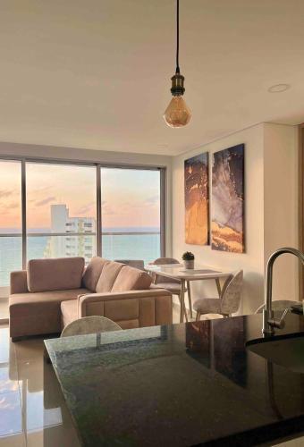 Posezení v ubytování Apartamento Moderno y Lujoso con vista al Mar PISO19 - Cerca a la Ciudad Amurallada