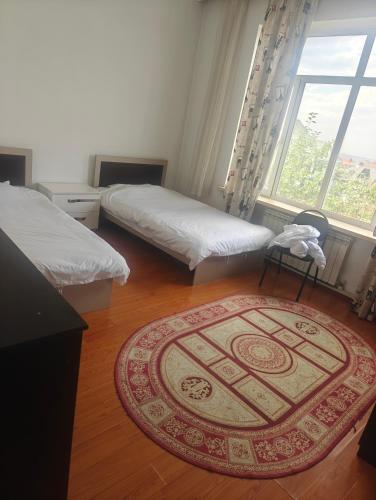 Ένα ή περισσότερα κρεβάτια σε δωμάτιο στο ZHU Bed and Breakfast Hotel