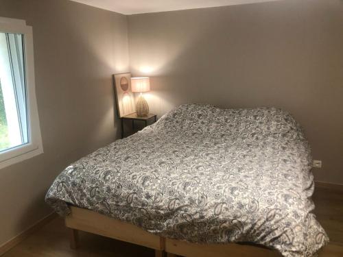 Postel nebo postele na pokoji v ubytování Studio Le Bon Coin