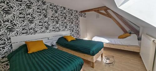 Postel nebo postele na pokoji v ubytování Gîte du Chaudron