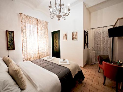 Postel nebo postele na pokoji v ubytování La Casa dei Carrai