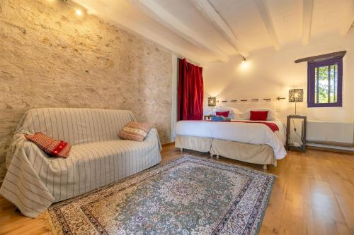 Ein Bett oder Betten in einem Zimmer der Unterkunft Domaine des Ormeaux