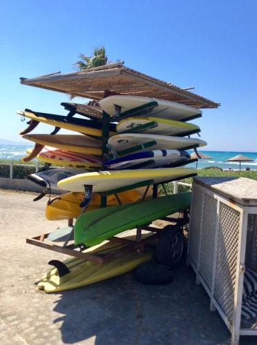 a stack of surfboards on a rack on the beach at Northern Cyprus, Trikomo, Iskele, Long Beach, Caesar Resort, 8 in Mağusa