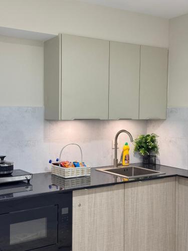 Køkken eller tekøkken på Cozy Studio Apartment