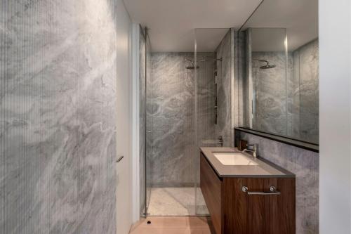 a bathroom with a shower and a sink at The Ritz-Carlton, Mexico City in Mexico City