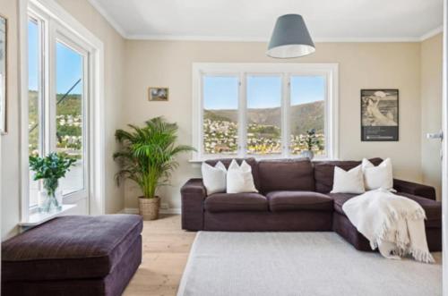 Posezení v ubytování Bright apartment with mountain views