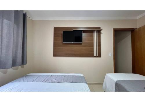 Postel nebo postele na pokoji v ubytování Flat Bueno Inn