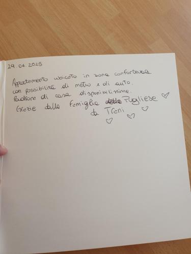 a white piece of paper with writing on it at Laura's RHome in Rome