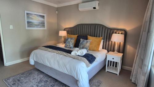 Ένα ή περισσότερα κρεβάτια σε δωμάτιο στο Parkhurst Luxe Retreat
