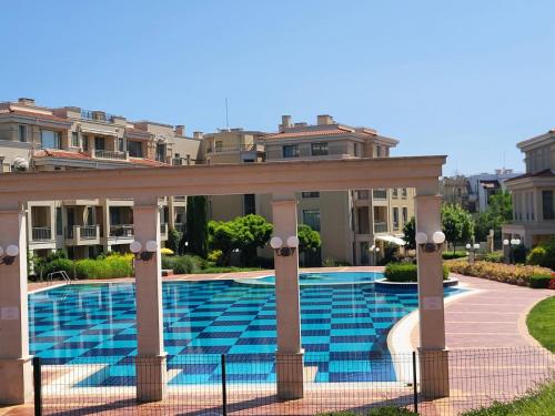 a swimming pool in a villa with a gazebo at Solea Studio in Chernomorets