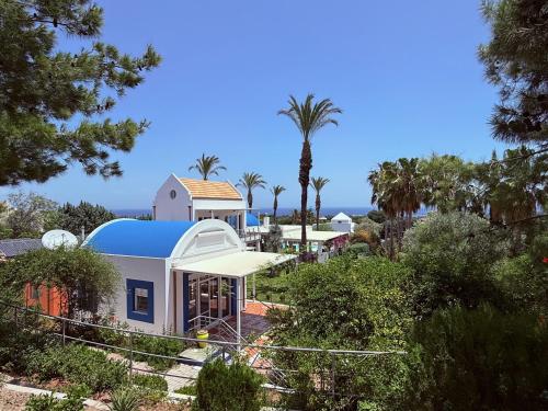Κήπος έξω από το Grande Dame Villa of Rhodes